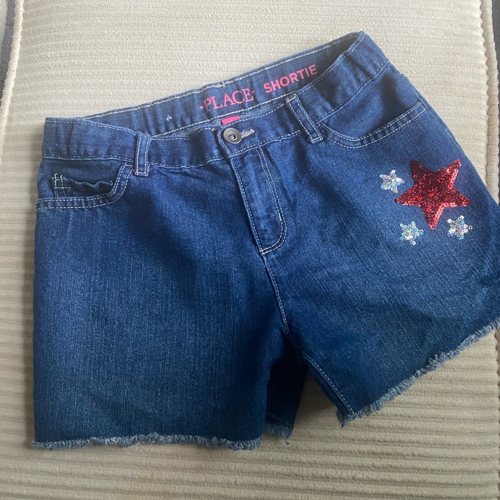 Childrens Place girls jean shorts, size 12. Never worn.